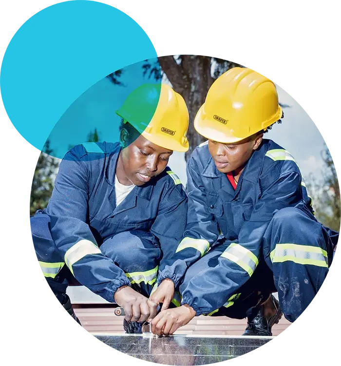 Trainees working together during hands-on training for the E-mobility course in Kenya